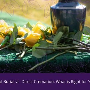 A cremation urn lies surrounded by flowers. We at Wojcik Funeral Chapel stand with you to remember your loved ones the way you want.